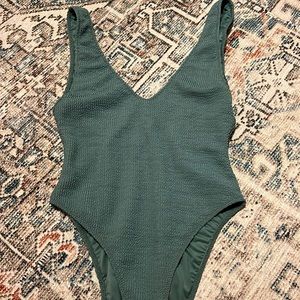 High cut low back ripple fabric one piece bathing suit